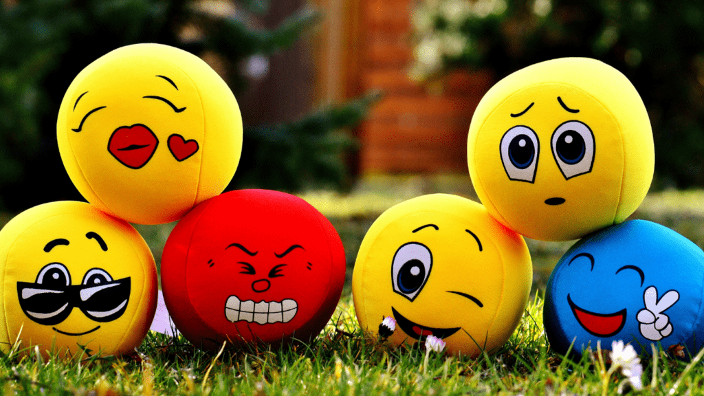 a group of colorful emoticions