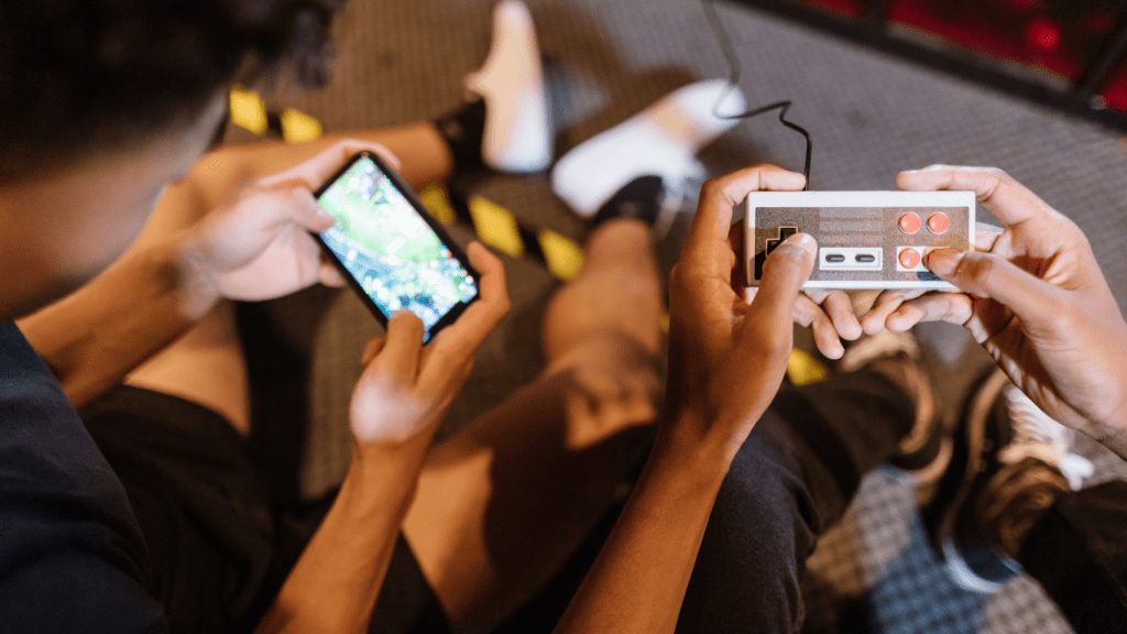 a group of people sitting on the floor playing video games