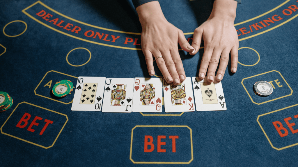 a person playing blackjack on a casino table