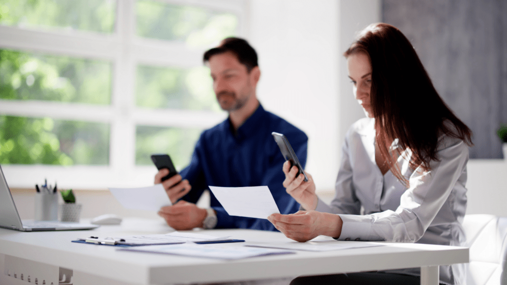 a person holding a cheque