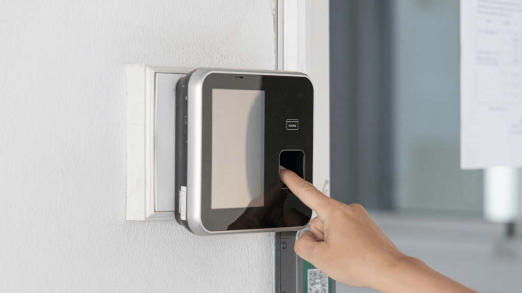 a person using an electronic keypad to open a door