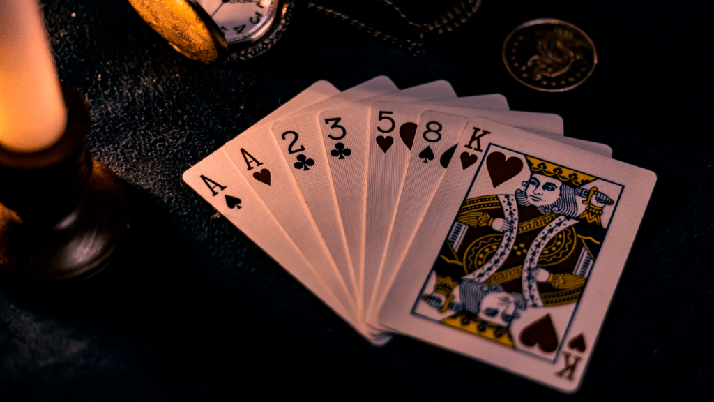 a pile of playing cards on top of each other