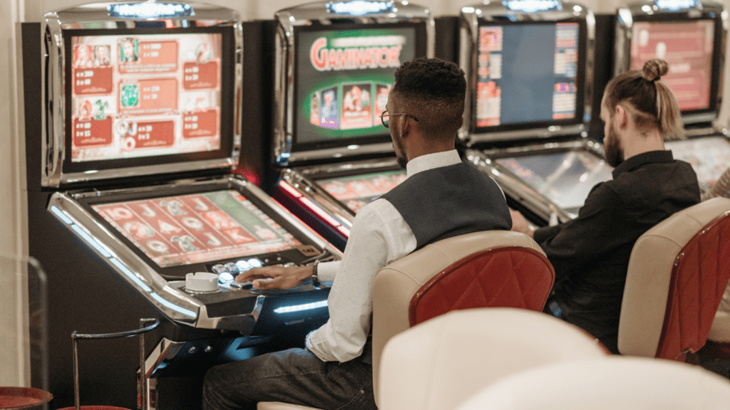 a row of slot machines in a casino